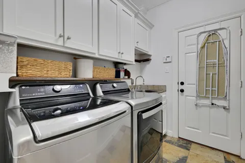 a view of kitchen and utility room