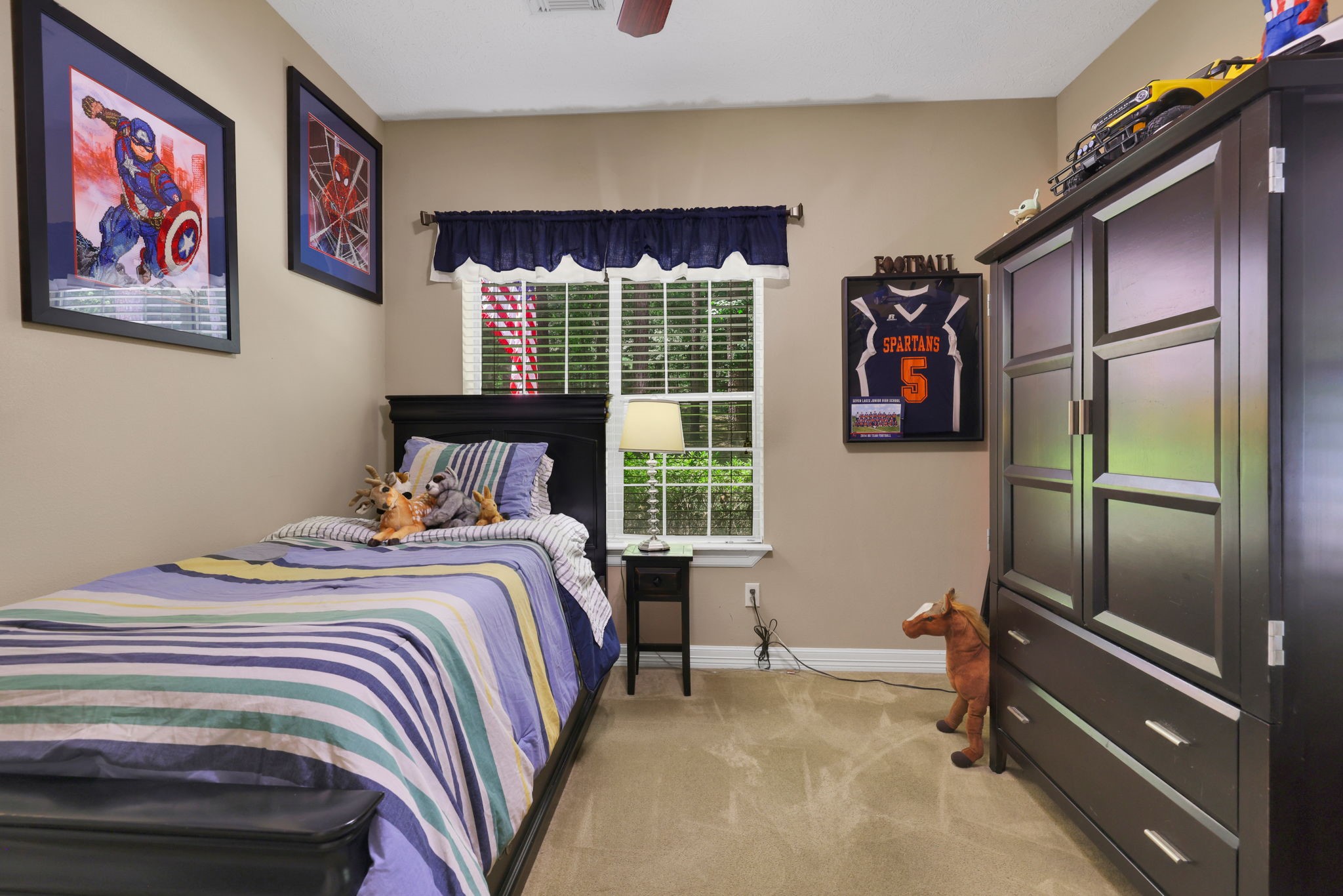 991 Kings Way Coldspring, TX 77331 - Photo 26 of 49 a bedroom with a bed and a window