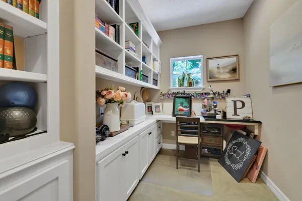 a view of kitchen center with furniture and flat screen tv