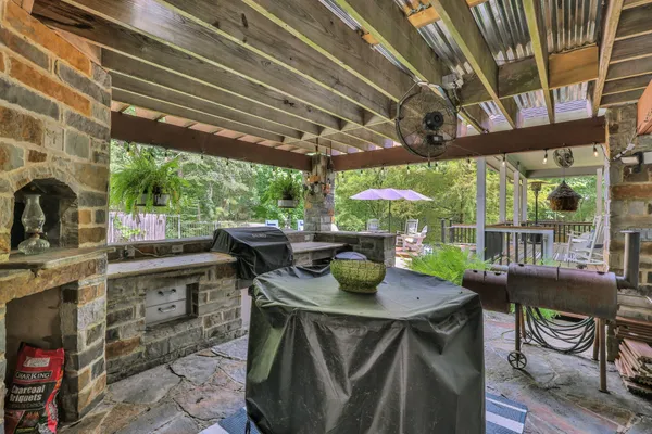 a outdoor dining space with furniture and garden view