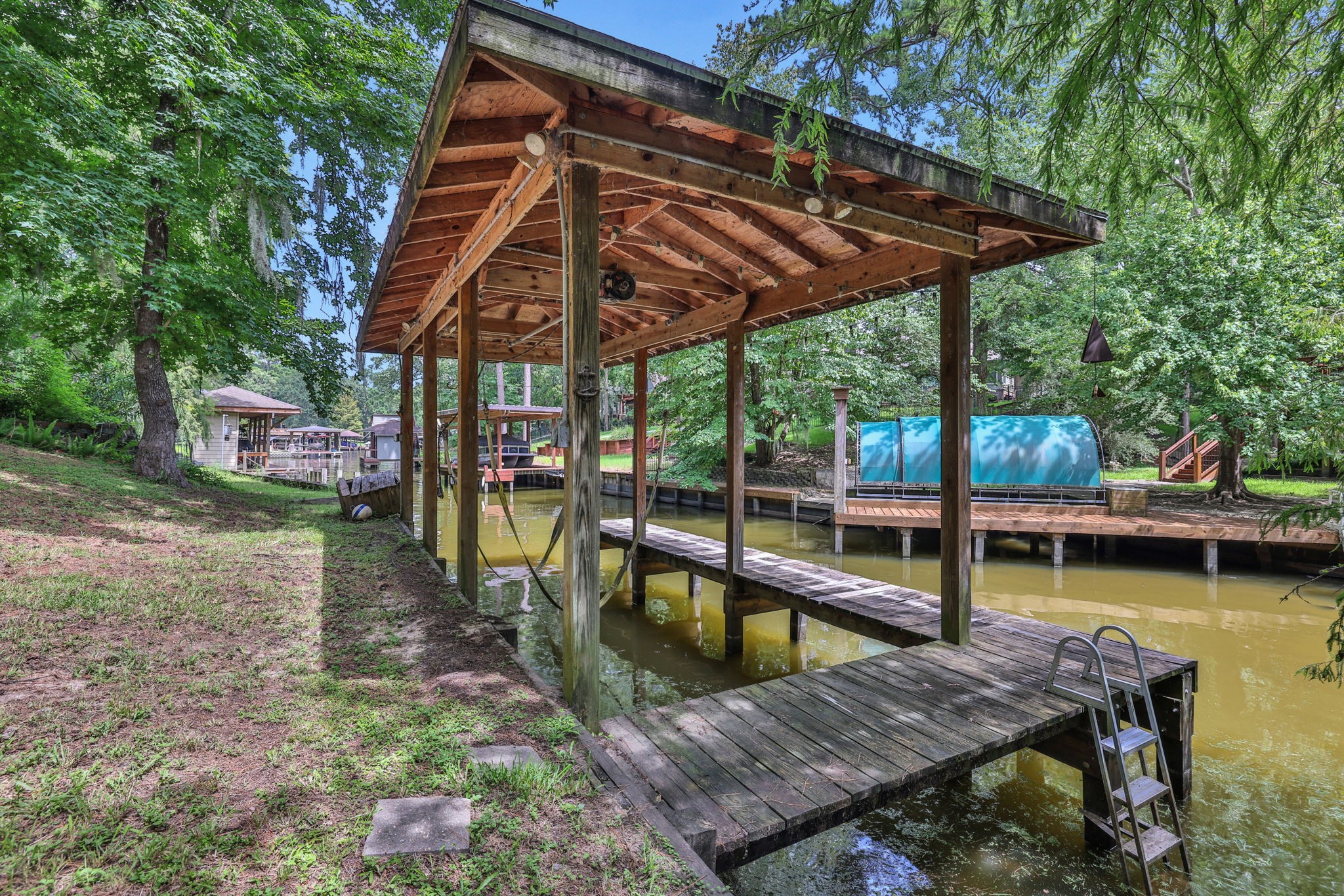 991 Kings Way Coldspring, TX 77331 - Photo 42 of 49 a view of a swimming pool with a patio