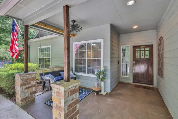 a living room with furniture and window