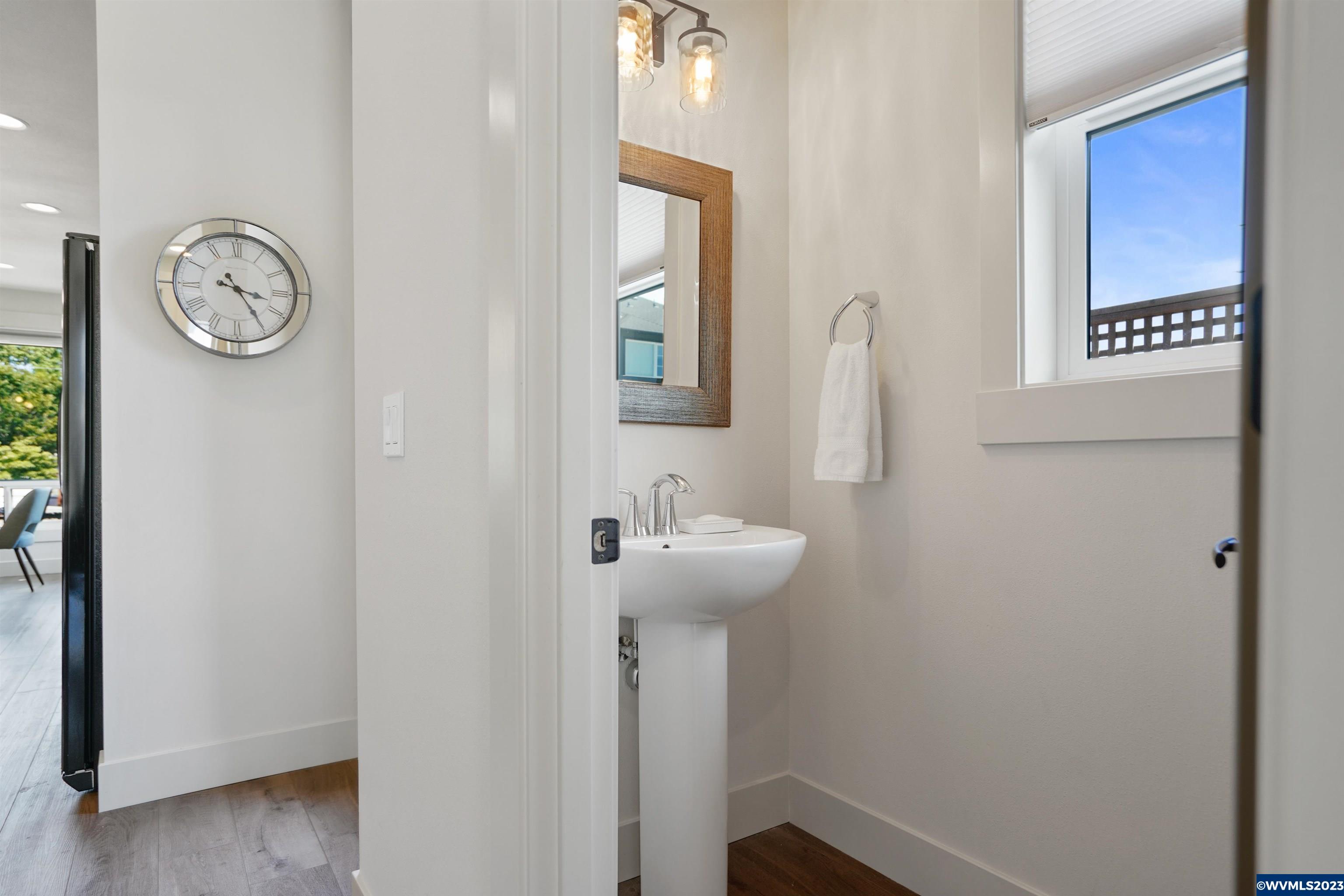 1956 Southwest 53rd Street Corvallis, OR 97333 - Photo 19 of 41 a bathroom with a sink and a mirror