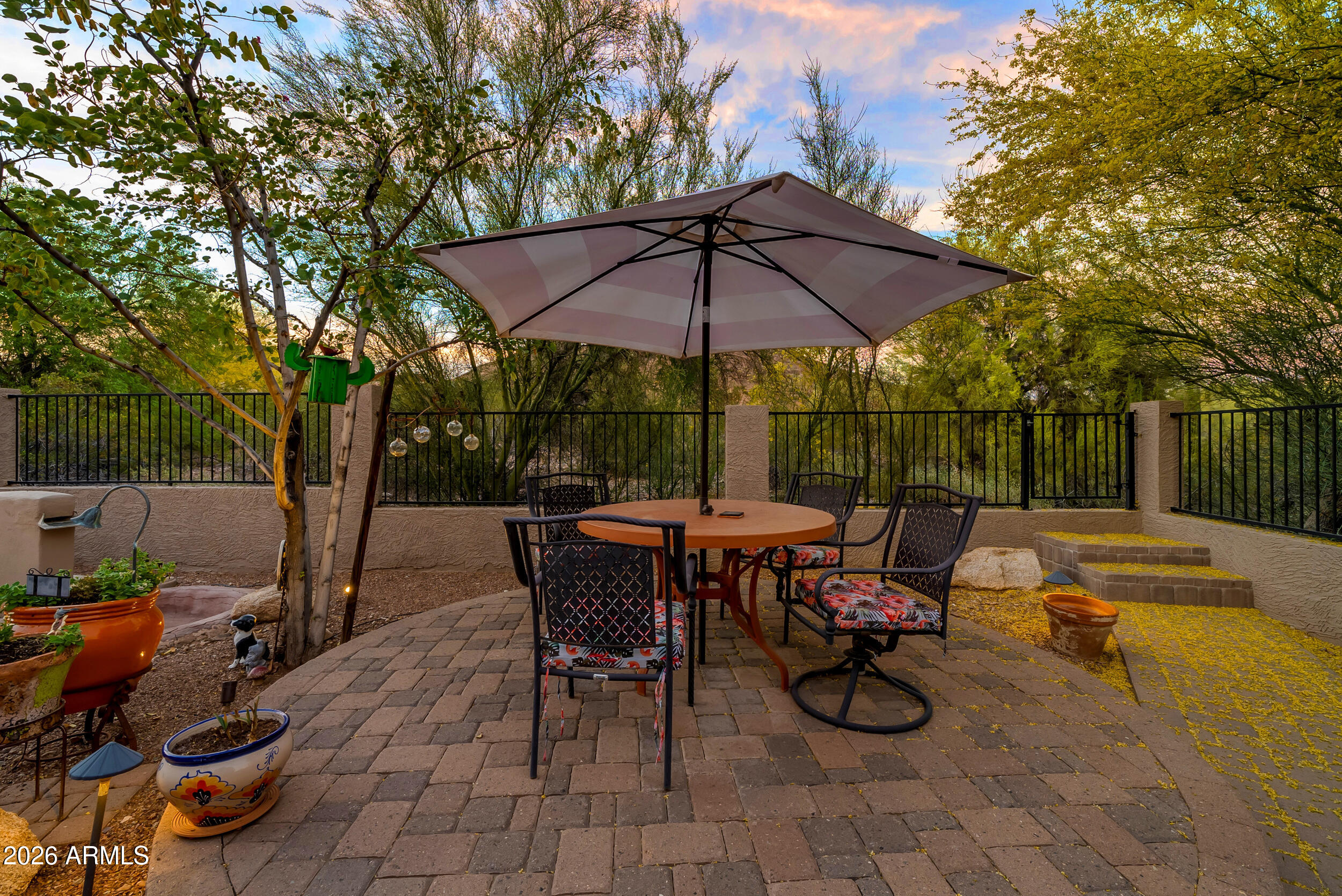 1539 East Winged Foot Road Phoenix, AZ 85022 - Photo 52 of 64 a view of backyard with outdoor seating a patio and plants