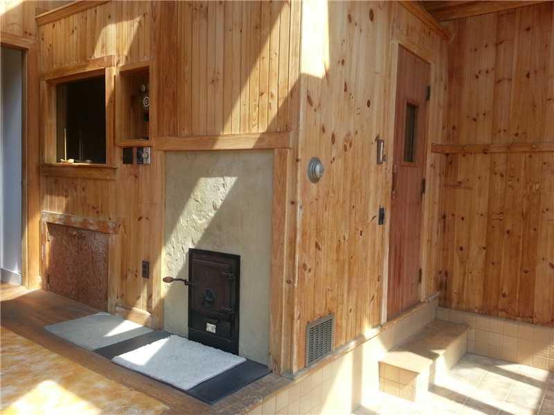 141 Halls Corner Road Belmont, ME 04952 - Photo 13 of 35 Other. Feed the woodstove for the sauna!