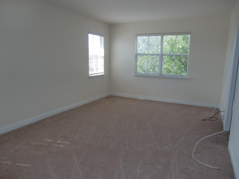 2691 Southwest 99th Way, Unit 2691 Miramar, FL 33025 - Photo 9 of 17 an empty room with a window