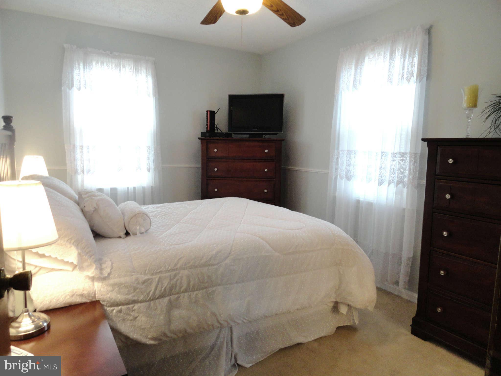 613 George Avenue Baltimore, MD 21221 - Photo 13 of 30 Newly Painted, Chair Rail, Ceiling Fan with Light