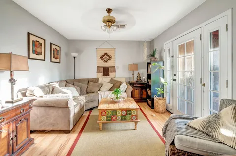 a living room with furniture and a couch