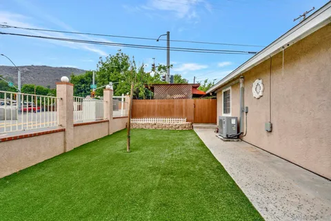 a house view with a garden space