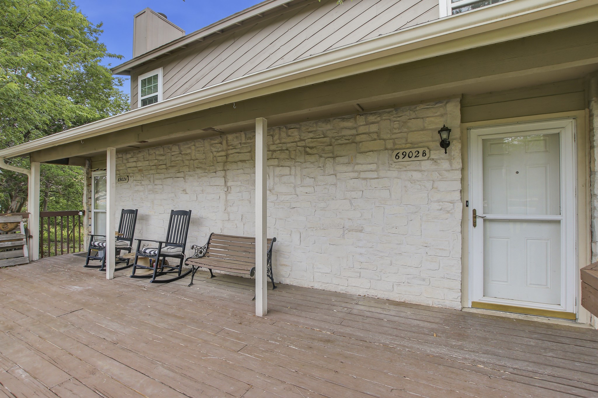 6902 Rifle Bend Austin, TX 78736 - Photo 4 of 33 a view of chairs and tables in patio of a house