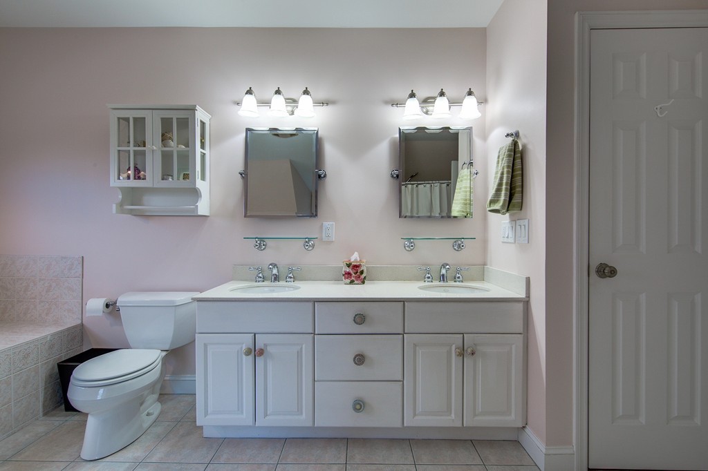 55 Glendale Road Boxford, MA 01921 - Photo 25 of 29 a bathroom with double vanity and a mirror