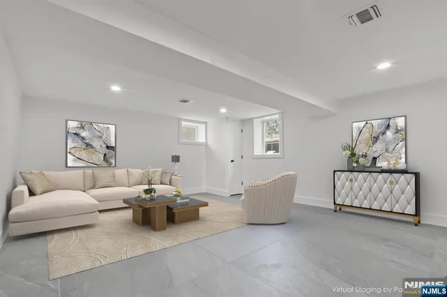 a living room with furniture and a couch