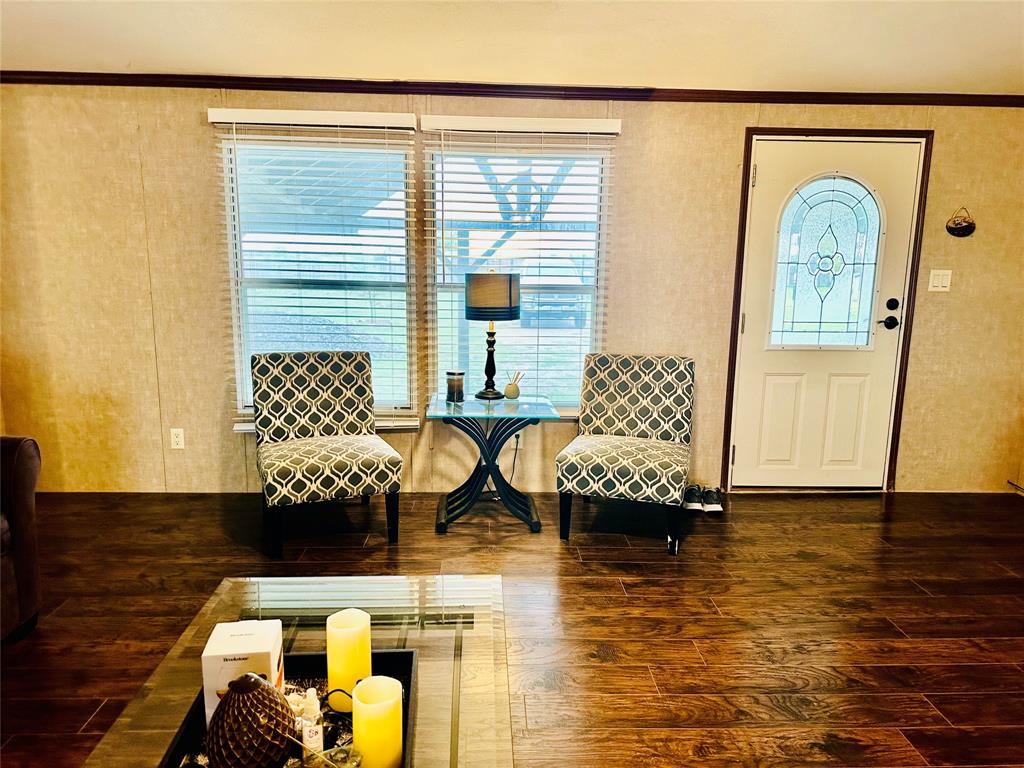 219 County Road 2723 Decatur, TX 76234 - Photo 14 of 26 a living room with furniture and wooden floor