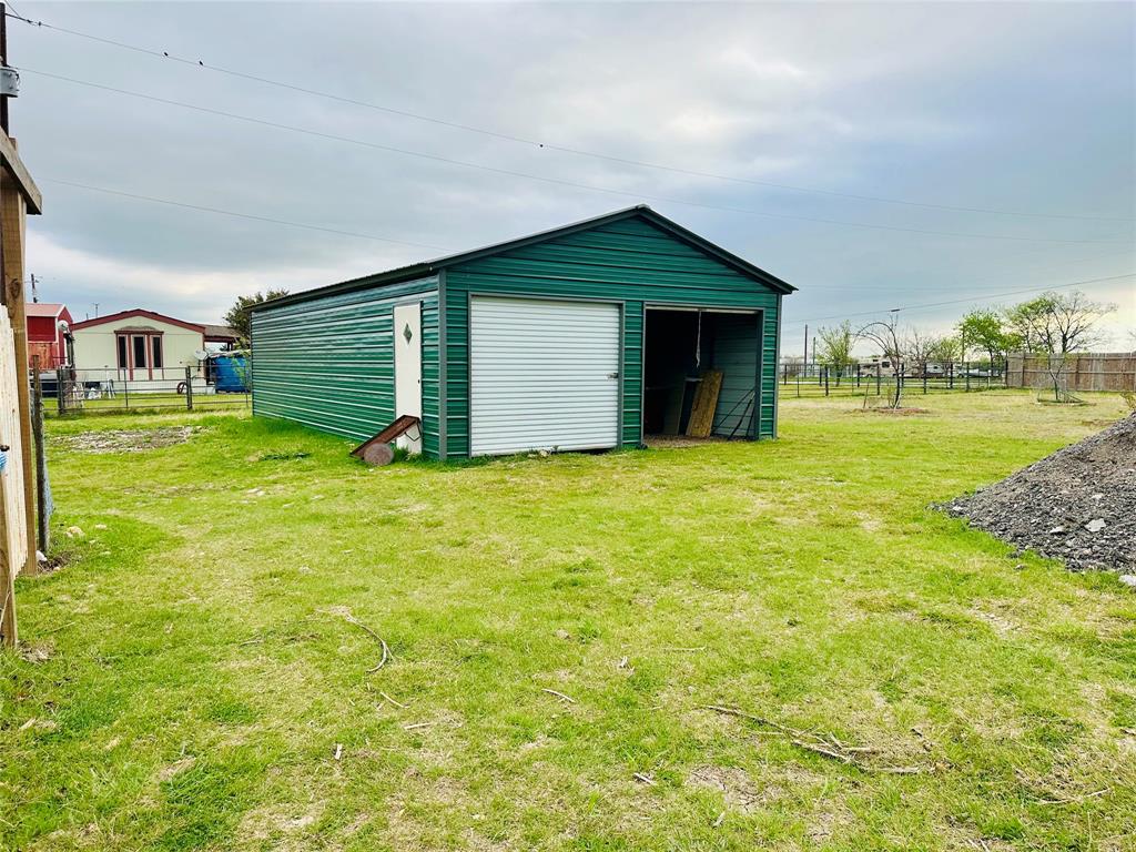 219 County Road 2723 Decatur, TX 76234 - Photo 7 of 26 a view of a house with a yard