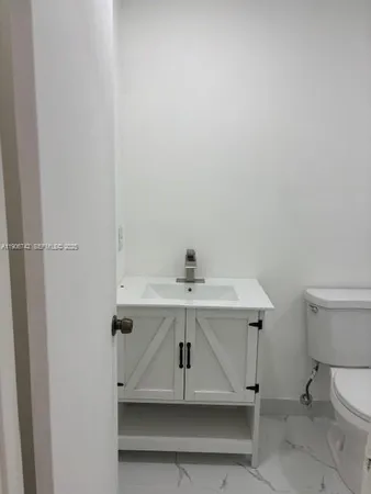 a view of bathroom with a sink