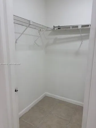 a view of a room with racks on the wall