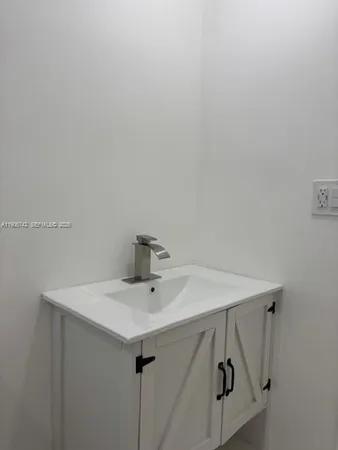 a utility room with a sink