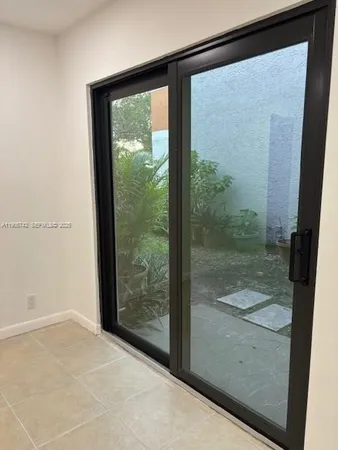 a view of a glass door with a glass door