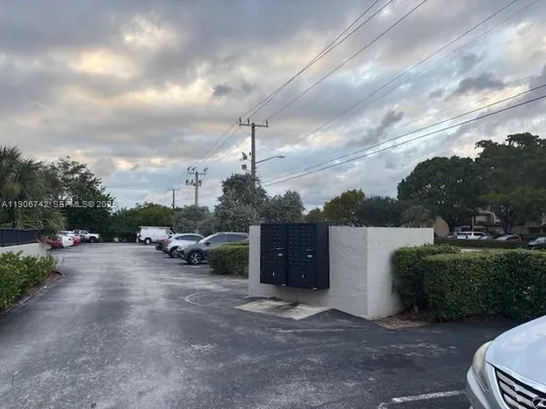 a view of a park with swings and slides