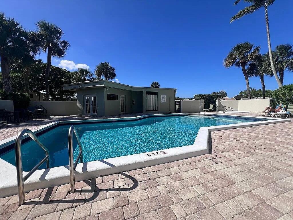 6463 La Costa Drive, Unit 105 Boca Raton, FL 33433 - Photo 3 of 40 a view of a chairs and table in the patio