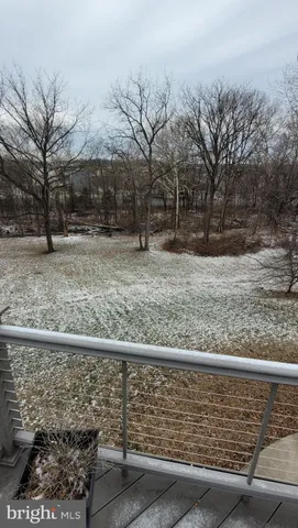 a view of a wooden floor with a yard