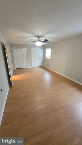 a bathroom with a sink a vanity and a mirror