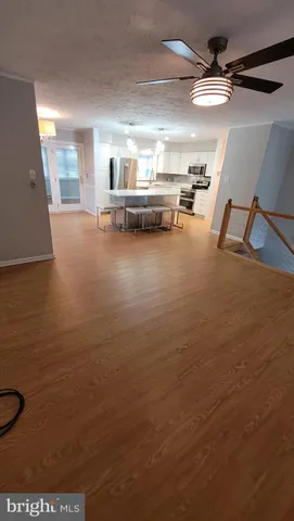 a view of a livingroom with furniture