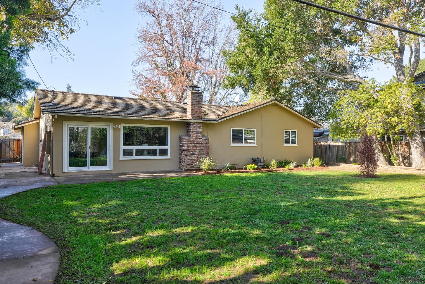 10510 Creston Drive Los Altos, CA 94024 - Photo 24 of 25 a view of a house with a backyard