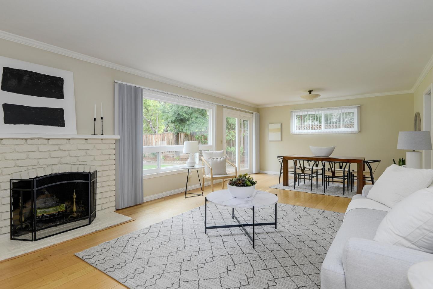 10510 Creston Drive Los Altos, CA 94024 - Photo 8 of 25 a living room with furniture and a fireplace