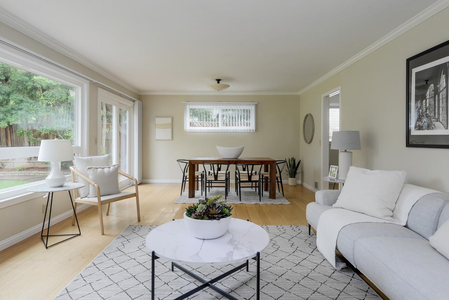 10510 Creston Drive Los Altos, CA 94024 - Photo 9 of 25 a living room with furniture and a large window