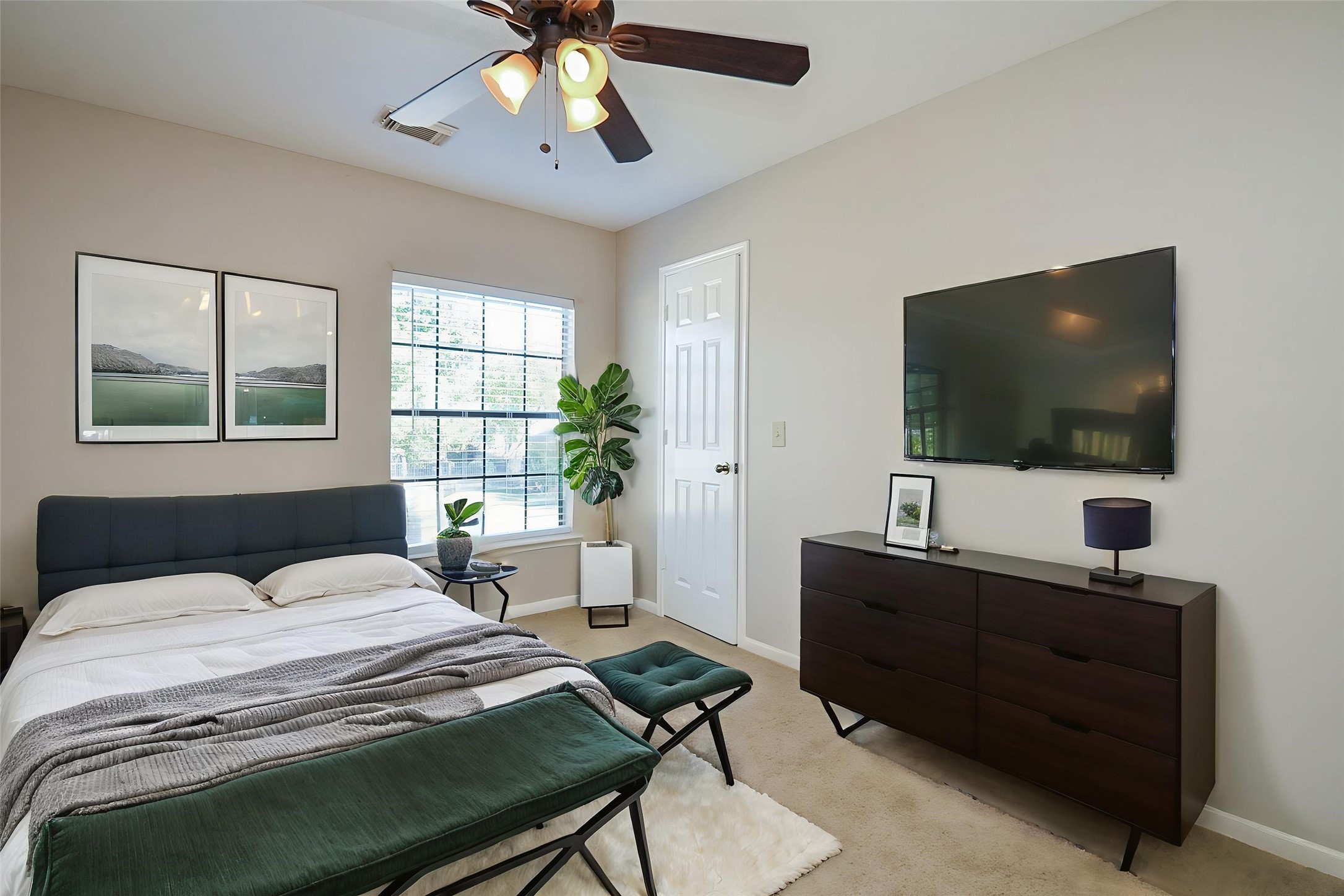 8803 Tweedbrook Drive Spring, TX 77379 - Photo 23 of 36 Notice the plush carpeting, the huge window providing natural lighting, and a ceiling fan to ensure comfortable temperatures year-round.