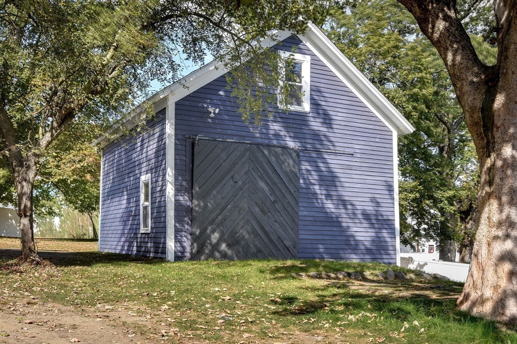 136 Commonwealth Road Wayland, MA 01778 - Photo 26 of 27 a view of a backyard of house