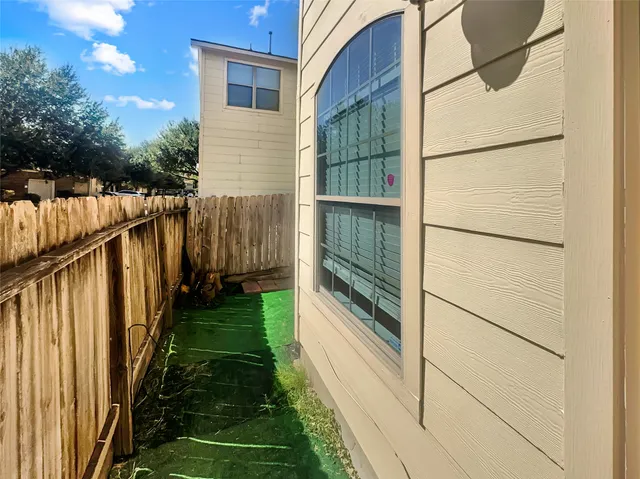 a view of a back yard of the house