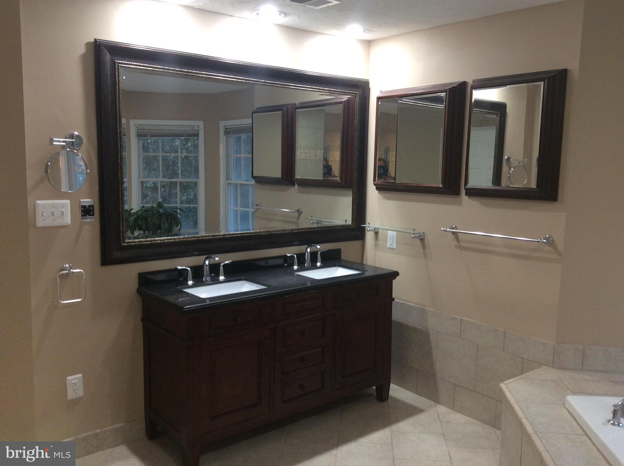54 Rutherford Circle Sterling, VA 20165 - Photo 40 of 58 MASTER BATH DOUBLE SINKS WITH GRANITE