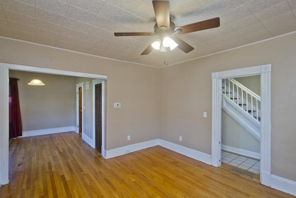 4 Laurel Street Chicopee, MA 01020 - Photo 15 of 35 wooden floor in an empty room with a window