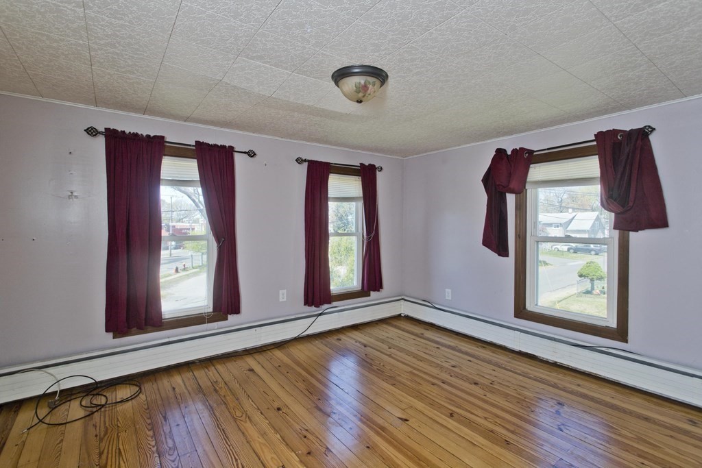 4 Laurel Street Chicopee, MA 01020 - Photo 16 of 35 a view of front door with wooden floor