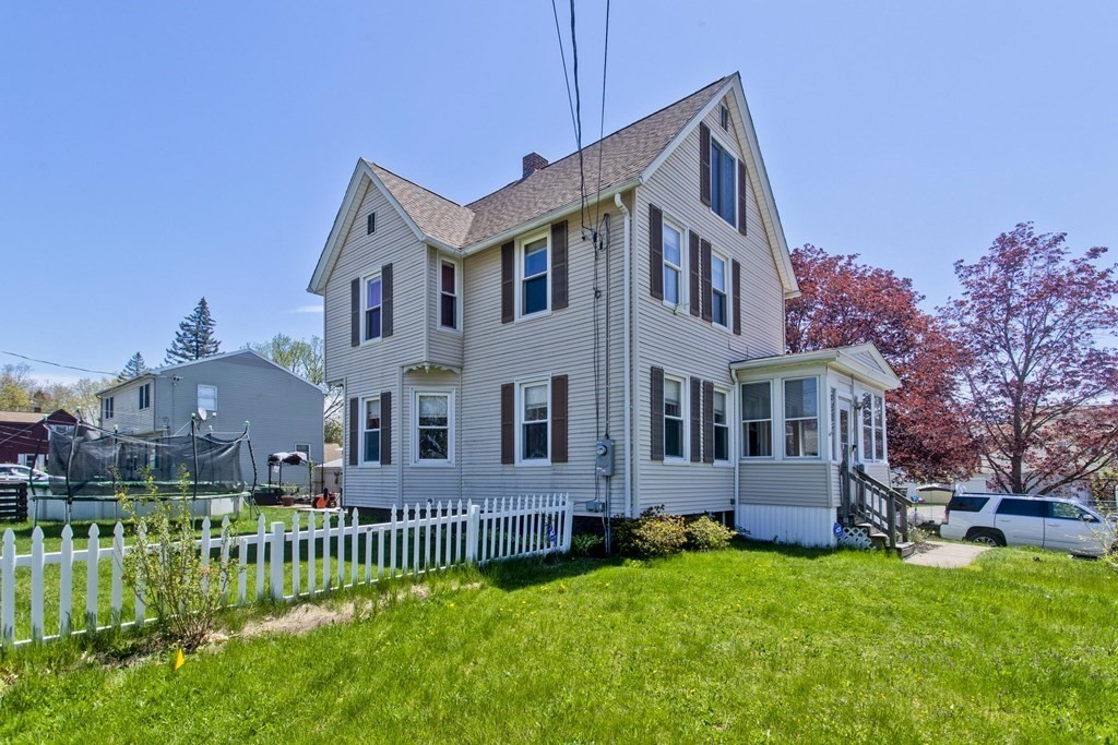 4 Laurel Street Chicopee, MA 01020 - Photo 2 of 35 a view of a house with a yard