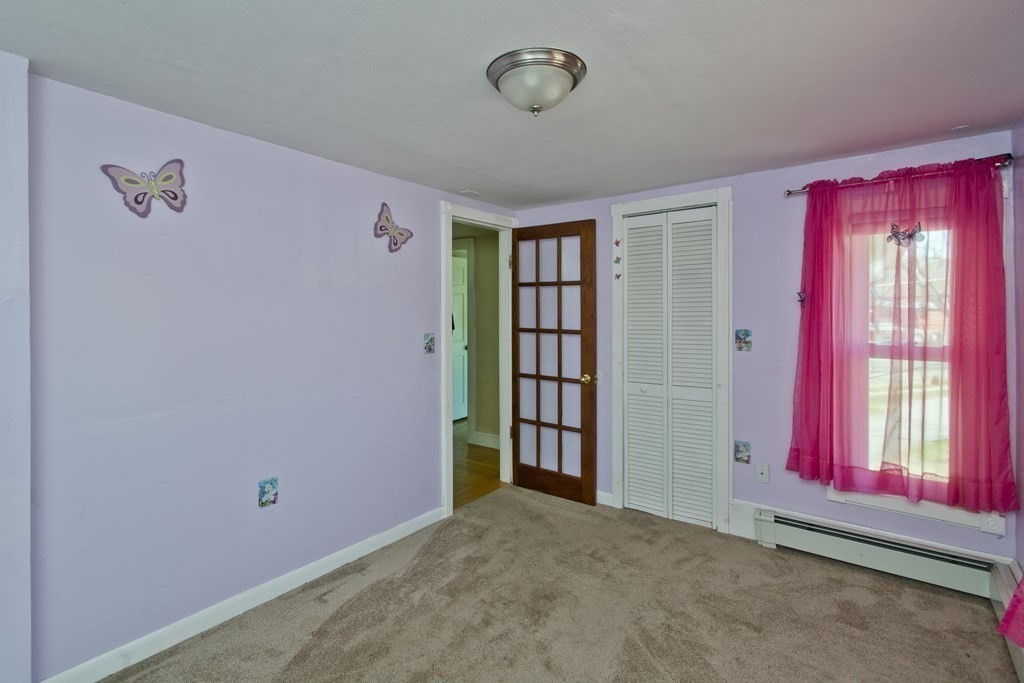 4 Laurel Street Chicopee, MA 01020 - Photo 23 of 35 an empty room with windows