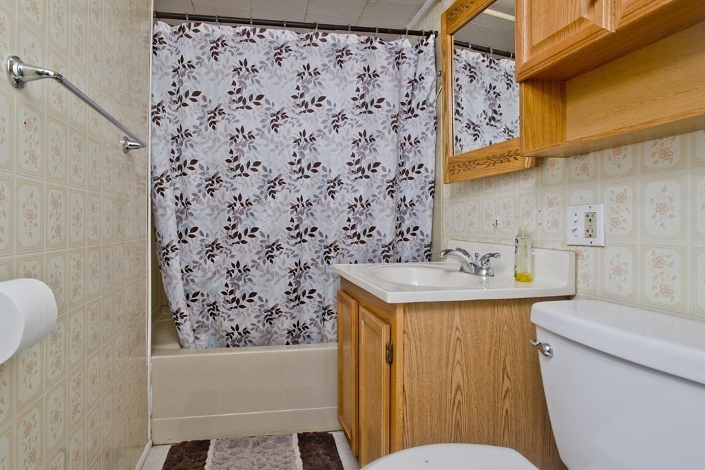 4 Laurel Street Chicopee, MA 01020 - Photo 25 of 35 a bathroom with a sink toilet and shower