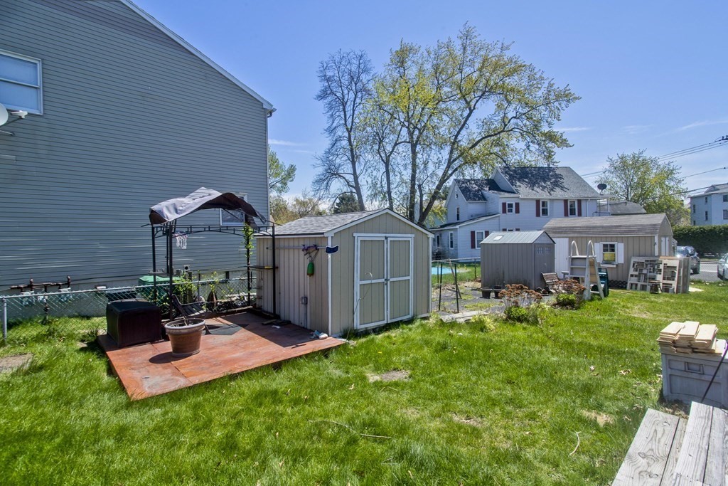 4 Laurel Street Chicopee, MA 01020 - Photo 32 of 35 a front view of house with yard and outdoor seating