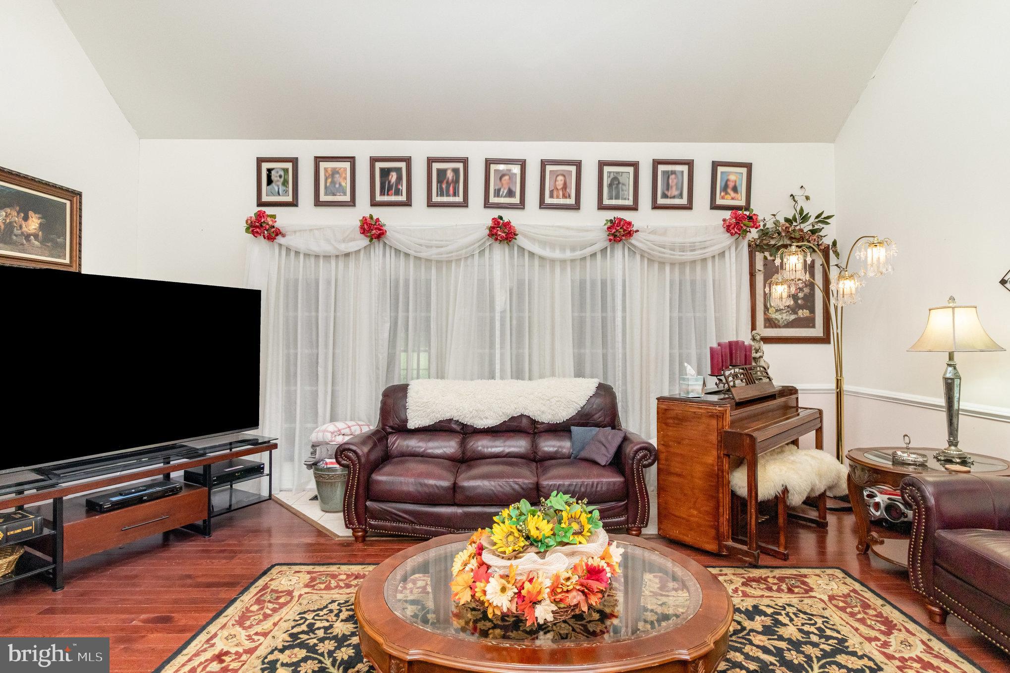 13467 Ellis Way King George, VA 22485 - Photo 12 of 81 a living room with furniture and a flat screen tv