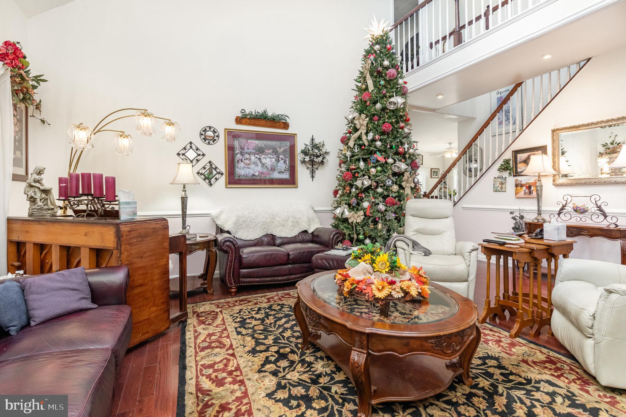 13467 Ellis Way King George, VA 22485 - Photo 13 of 81 a living room with furniture and a potted plant