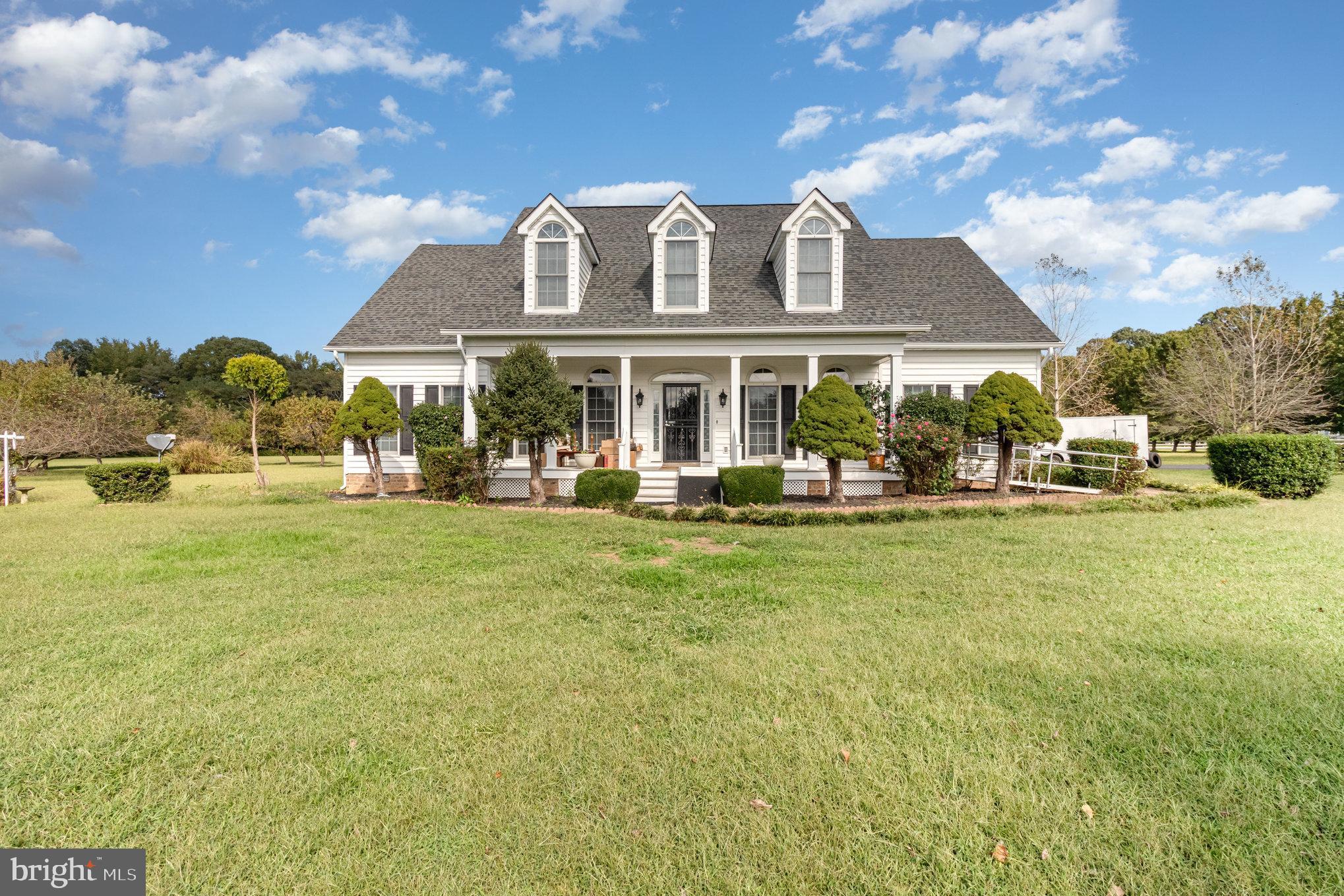 13467 Ellis Way King George, VA 22485 - Photo 2 of 81 a front view of a building with a garden