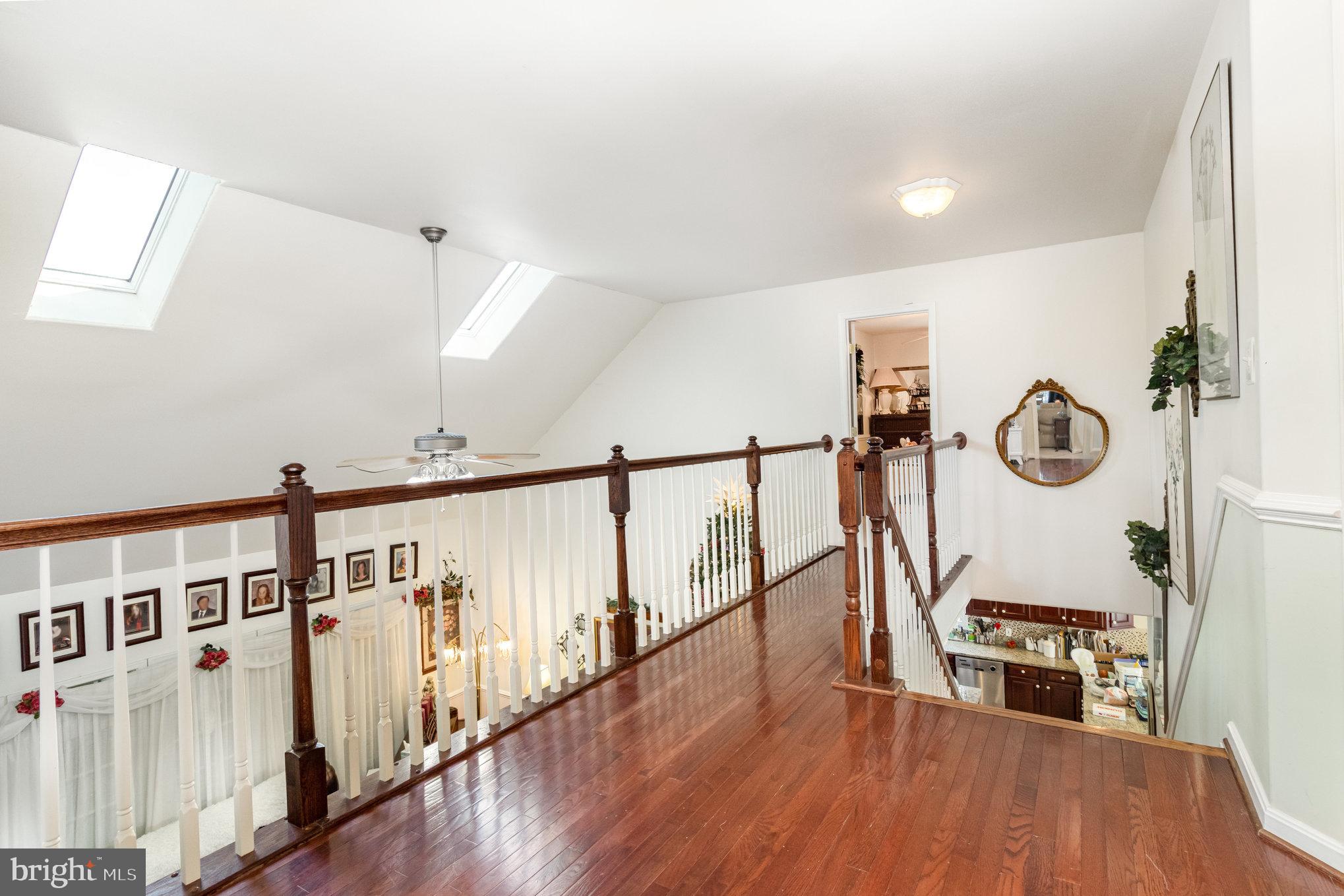 13467 Ellis Way King George, VA 22485 - Photo 22 of 81 a view of a hallway with wooden floor
