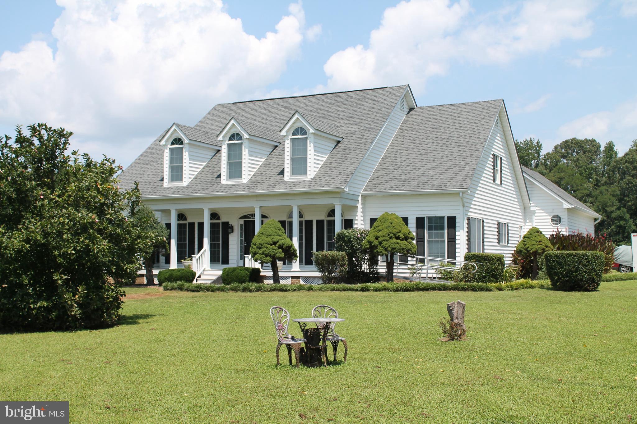 13467 Ellis Way King George, VA 22485 - Photo 58 of 81 a front view of a house with swimming pool and garden