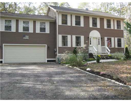 Exterior Front. HOUSE IS SET BACK ON LOT AT END OF LONG DRIVE WAY, NOT VISIBLE FROM STREET WHEN LEAVES ARE FULL