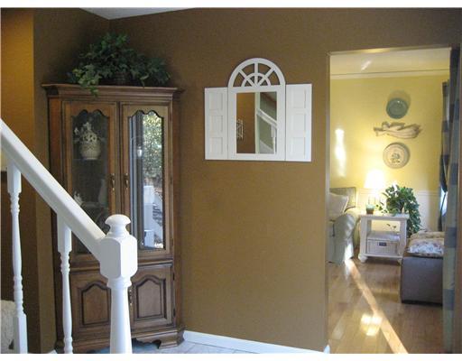 15 Arrowwood Road Coventry, RI 02816 - Photo 15 of 18 Entry. CHARMING CENTER HALL ENTRY IS BOTH SPACIOUS AND INVITING WITH MARBLE FLOORING