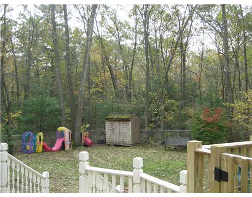 15 Arrowwood Road Coventry, RI 02816 - Photo 18 of 18 Yard/Garden. FENCED PLAY AREA WITH SHED,PROPERTY EXTENDS WELL BEYOND THIS AREA.LOT IS SO PRIVATE IT QUALIFIES AS SECLUDED