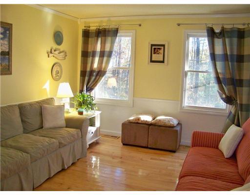 15 Arrowwood Road Coventry, RI 02816 - Photo 3 of 18 Living Room. CHARMING ALTERNATE VIEW EVRY WINDOW LOOKS OUT ON WOODED GROUNDS