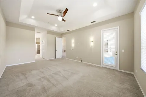 a view of an empty room with a window